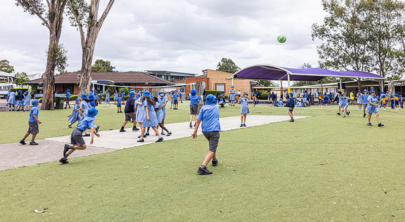 Students playing in the playground at St Andrews Primary School Marayong