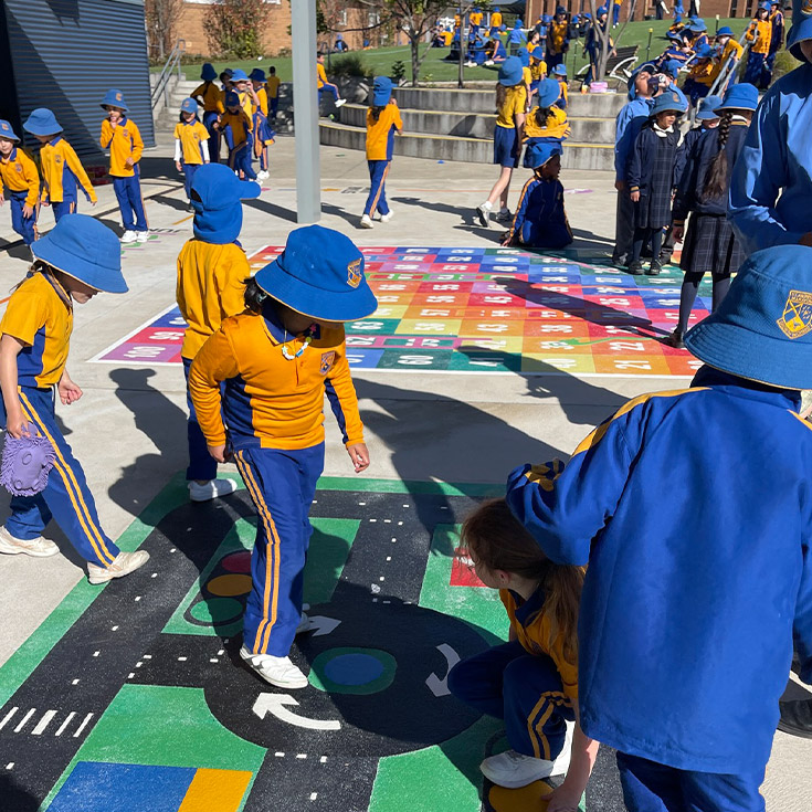 Students playing on the infant playground at St Andrews Primary School Marayong