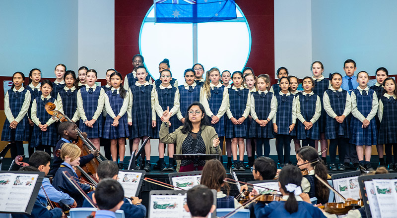 The school choir and band rehearsing for an event at St Andrews Primary School Marayong in 2018