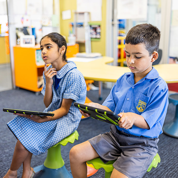 Students using their tablets at St Andrews Primary School Marayong